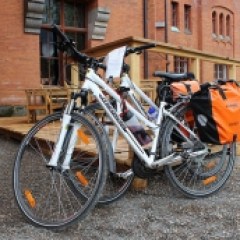 a bicycle parked on the side of a building in Tallinn