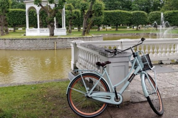 a bicycle parked in front of a lake in Tallinn, Estonia