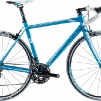 a bicycle leaning against a wall