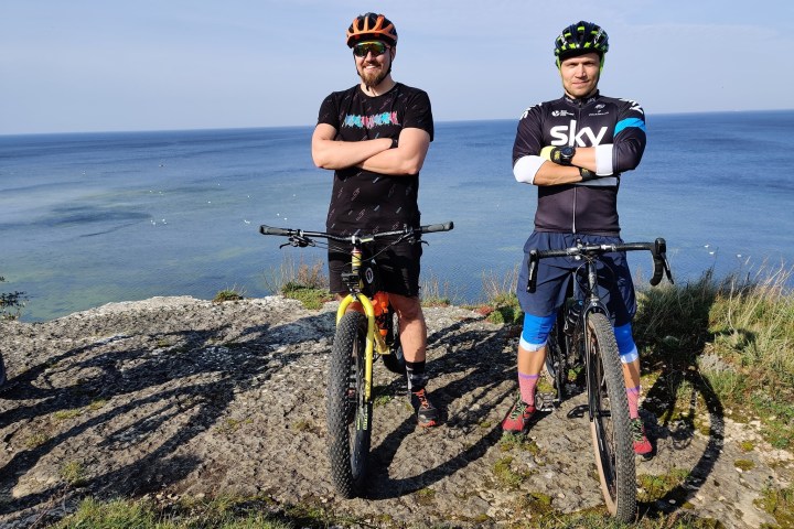 a man standing next to a bicycle in Tallinn