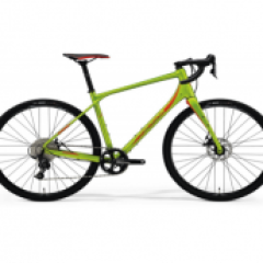 a bicycle leaning against a wall