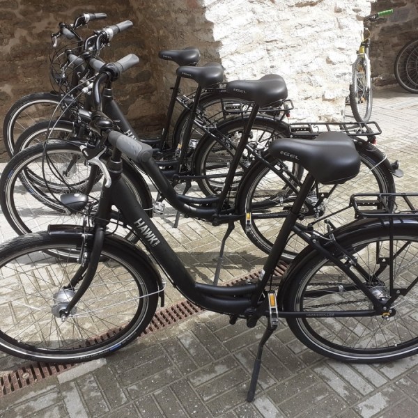 a bicycle parked on the side of a building in Tallinn