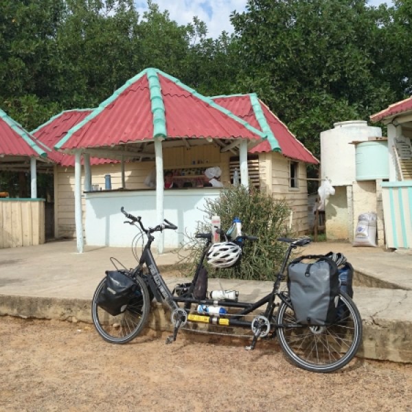 a bicycle parked in front of a house