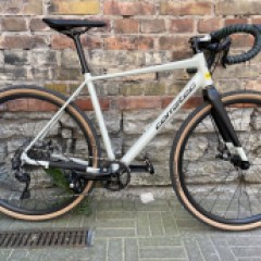 a bicycle parked on the side of a building in Tallinn