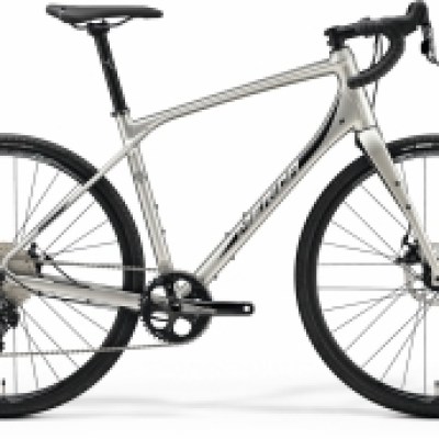 a bicycle leaning against a wall