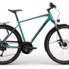 a bicycle leaning against a wall