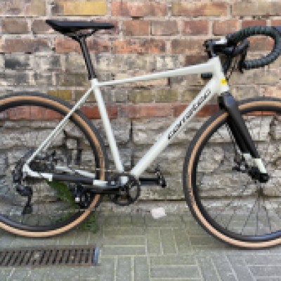 a bicycle parked in front of a building in Tallinn