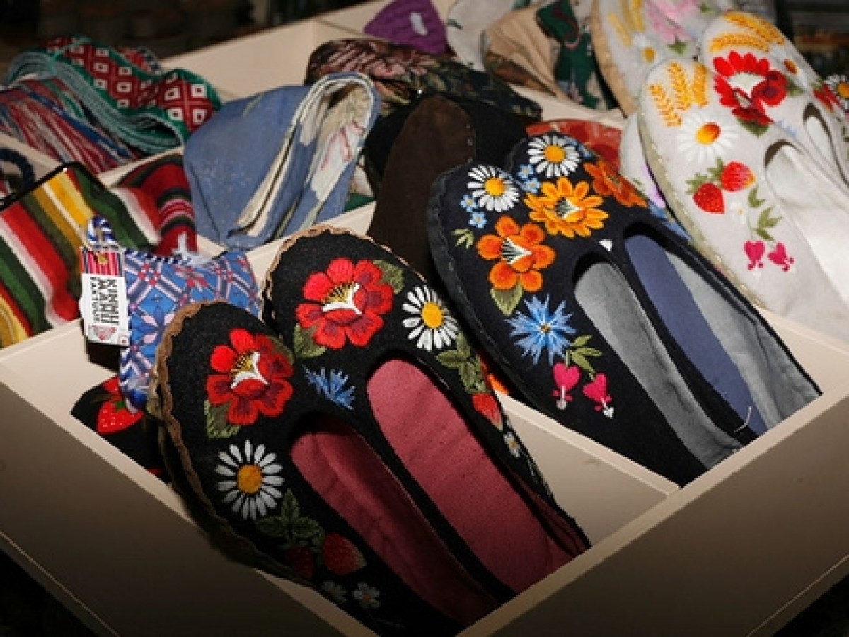 a group of clothes on a bed