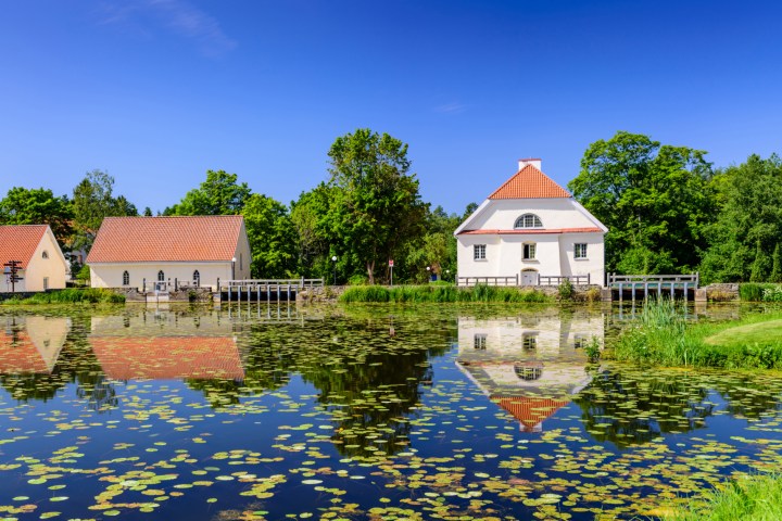 a small house in a pool of water