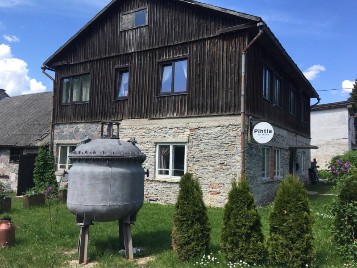 a statue in front of a house
