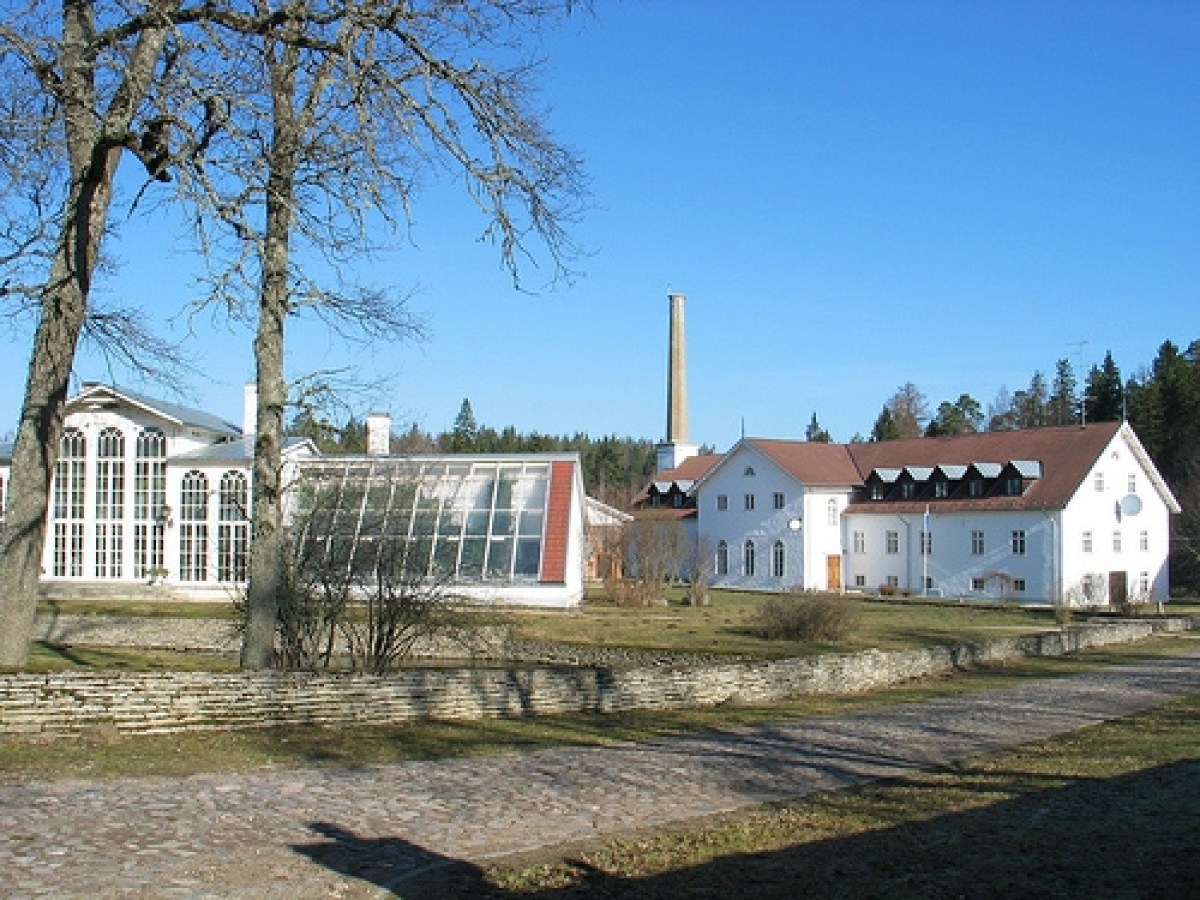 a house with trees in the background