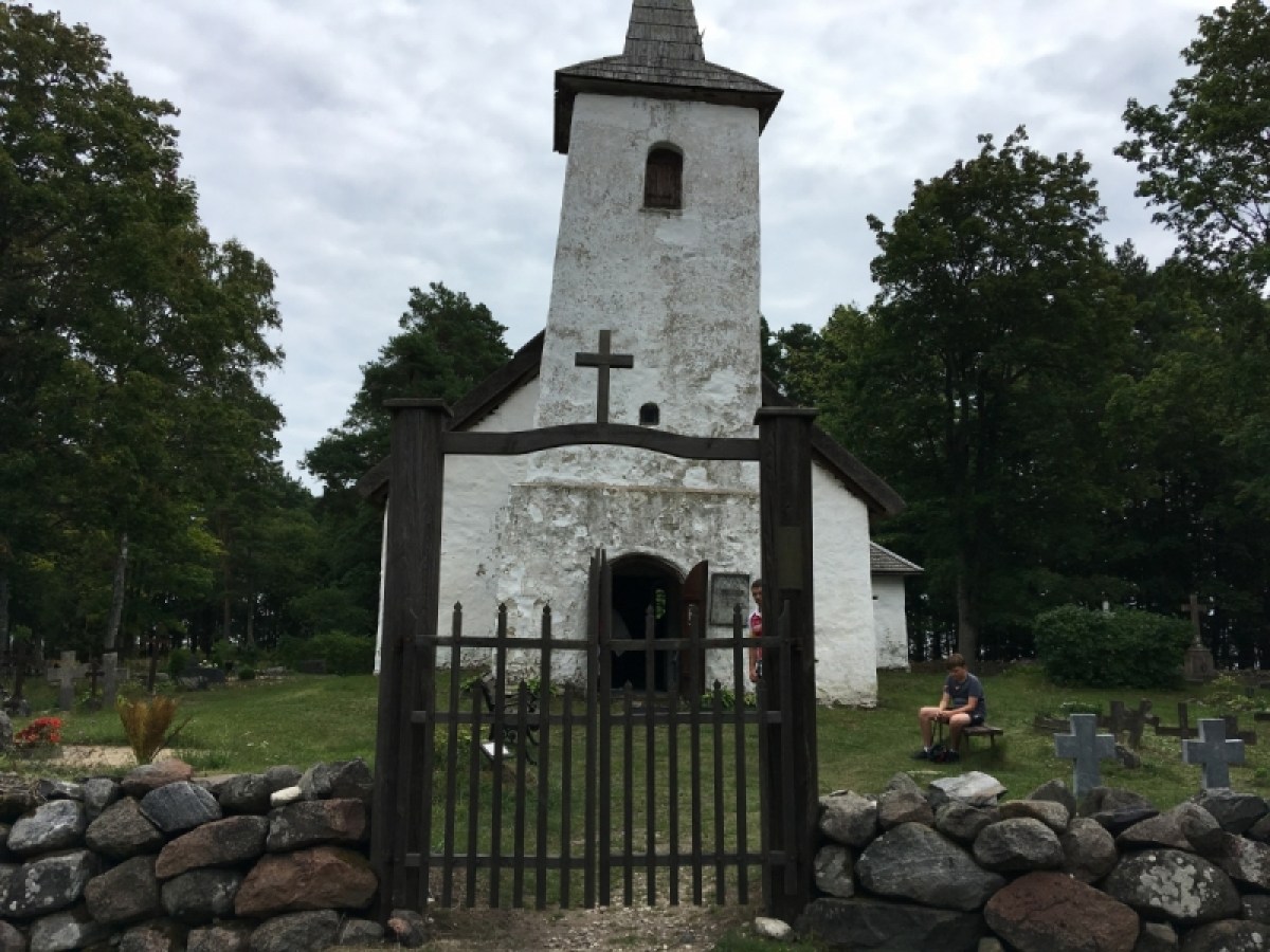 a large stone building with a clock tower
