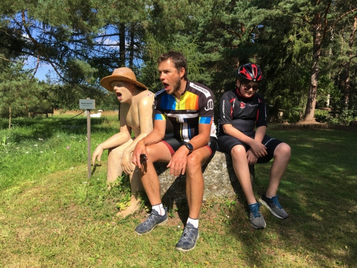 a man sitting in a park