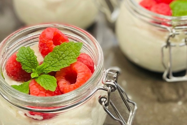 a cake with fruit on top of a table