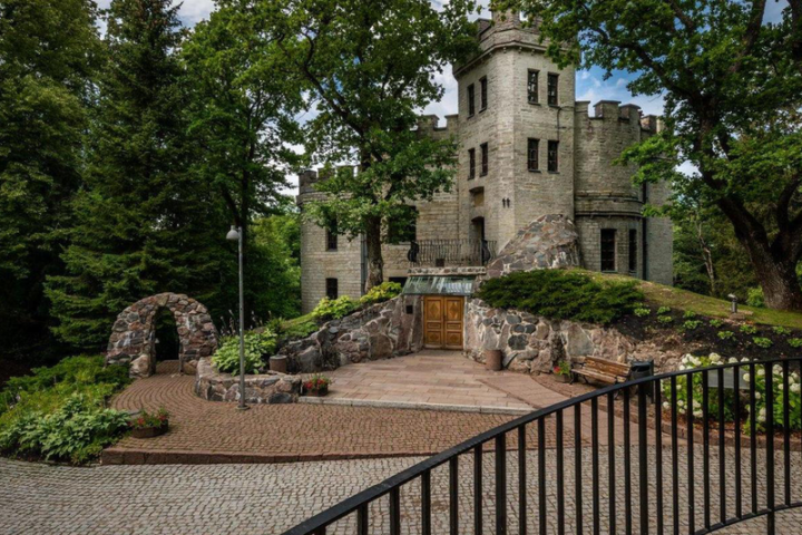 a castle on top of a wooden fence