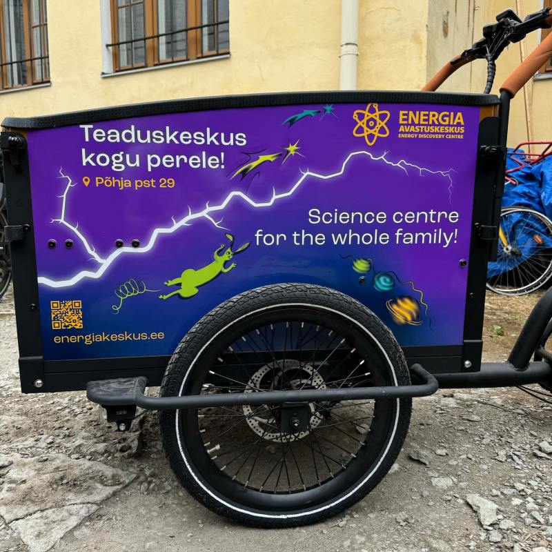 a motorcycle parked on the side of a building