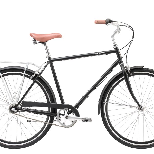 a bicycle leaning against a wall